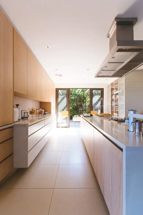 Kitchen renovation with fitted units and worktops completed in London by Soraiz Builders