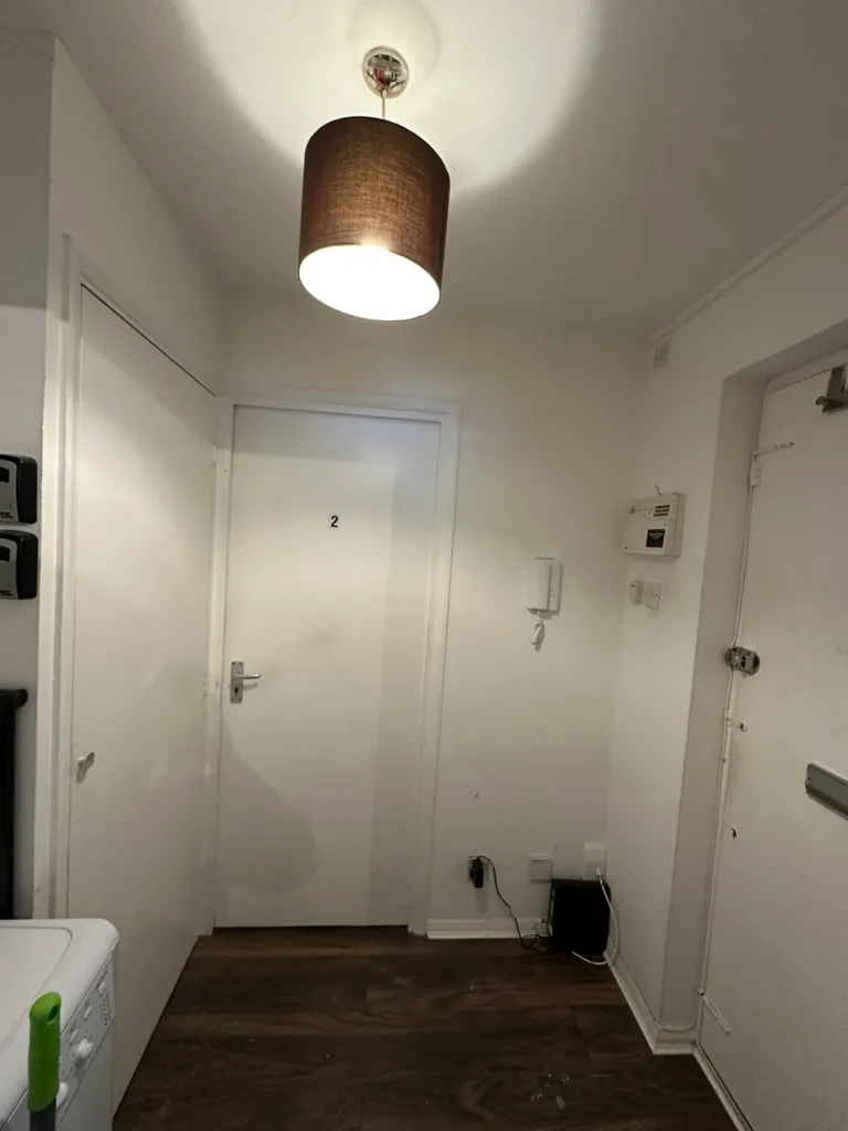The entrance hall with a new light fitting, Deptford