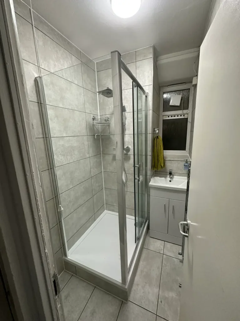 The shower room seen from the door, King's Park, Hackney