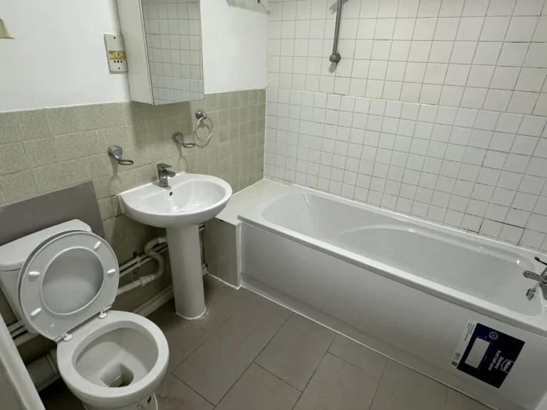 The bathroom finished with the new bath, basin and WC, Harrow Weald