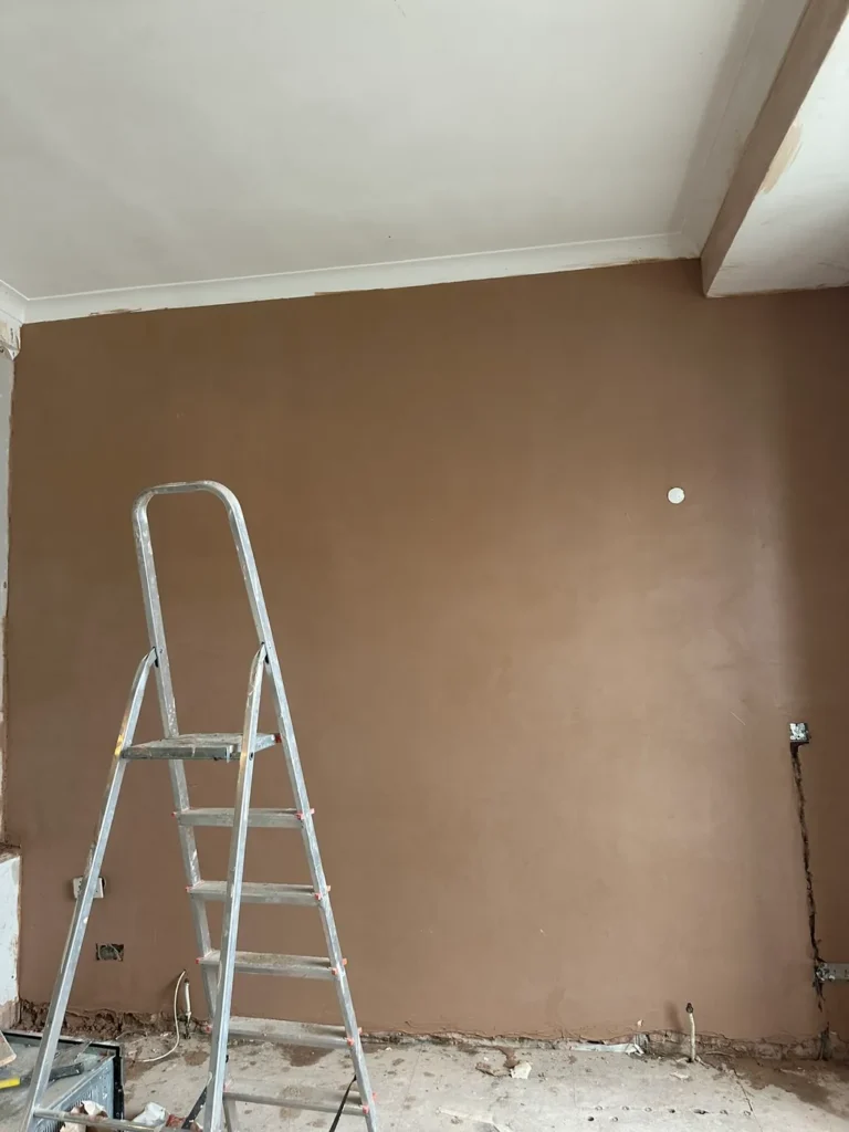 December 2024: a full wall freshly plastered, Lancaster Gate