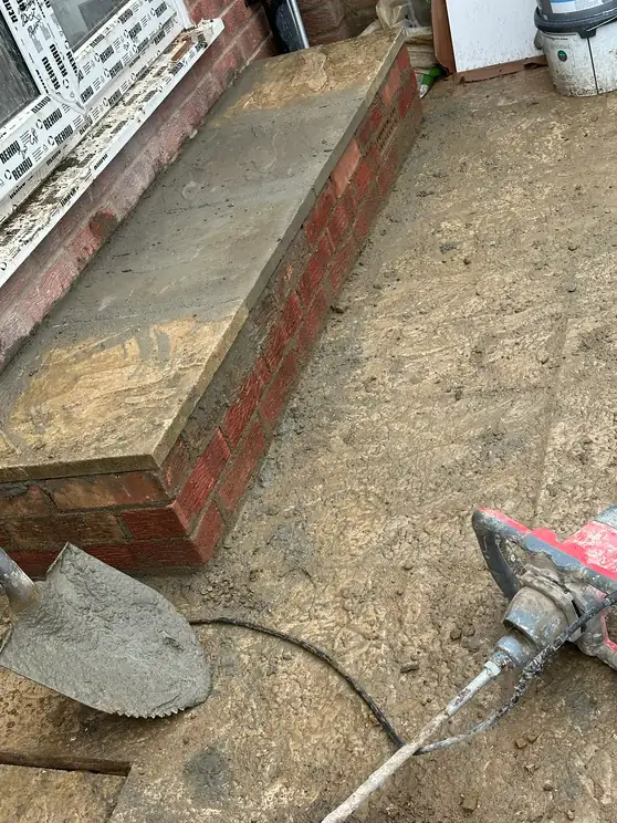 The front garden ground being prepared alongside, North Greenford
