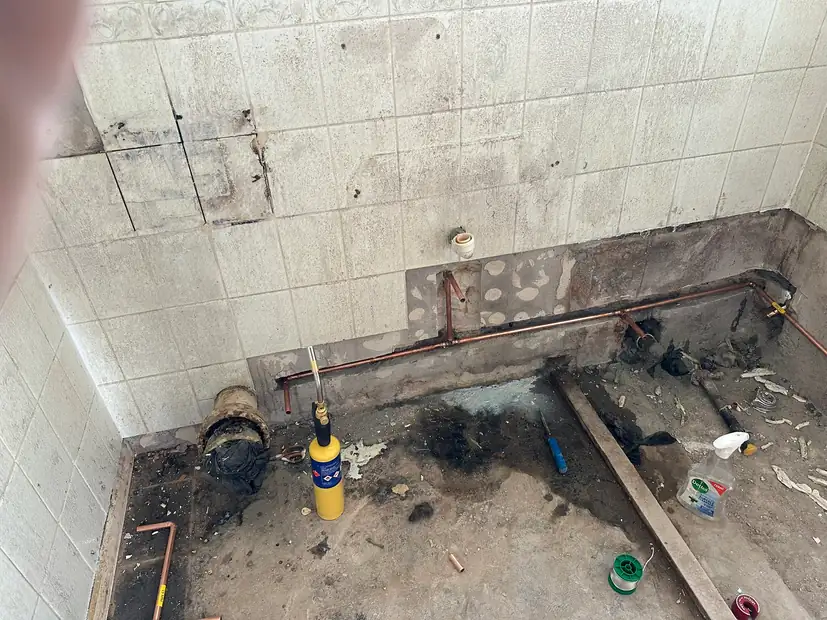 New copper supply pipework run in a stripped bathroom before tiling, Blendon, Sidcup