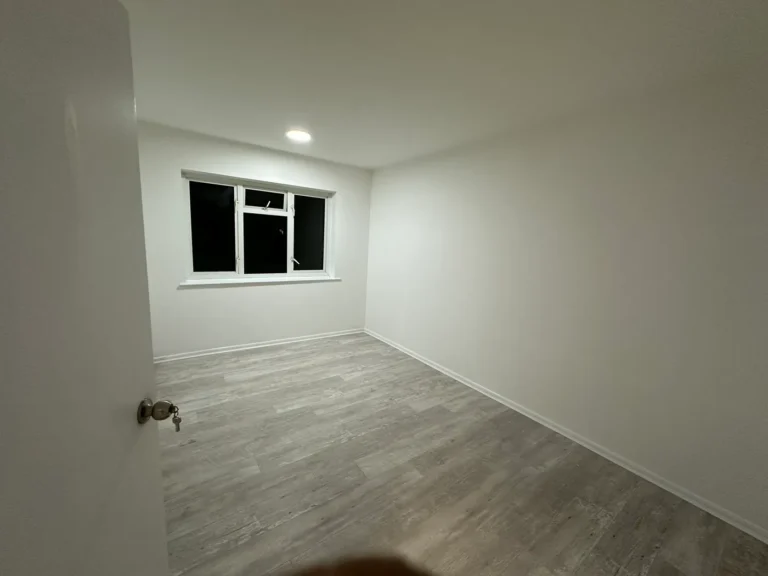 A finished bedroom with new flooring and white walls, Blendon, Sidcup