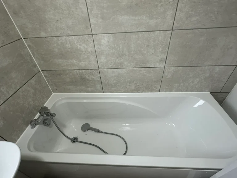 The new bath and tiling in the finished bathroom, Blendon, Sidcup