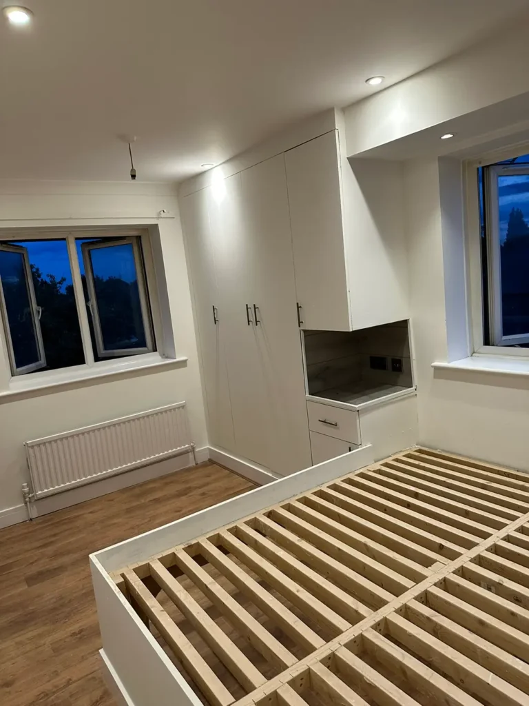 The top-floor bedroom finished with fitted wardrobes and downlights, Wexham Court, Slough