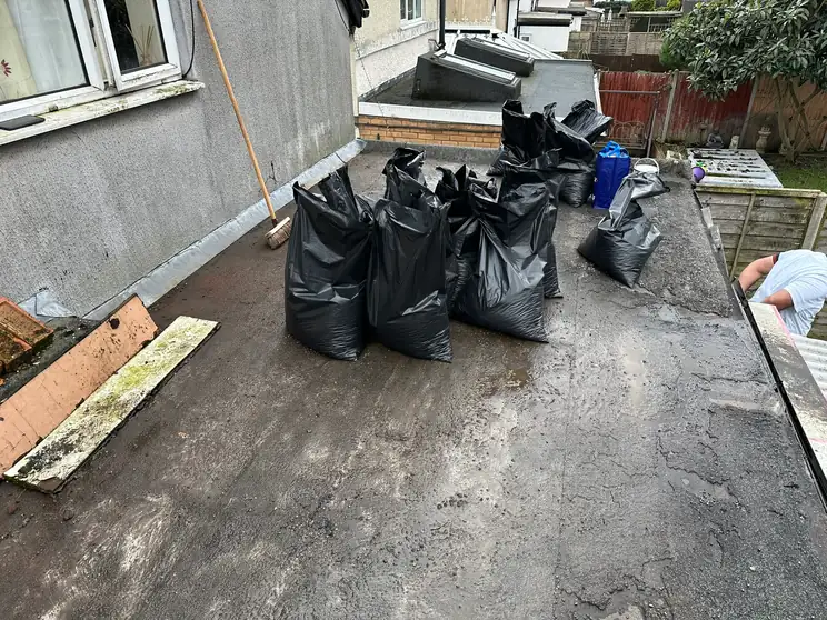 The old covering and rotten timber stripped and bagged up, Wealdstone