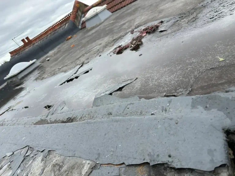 Split and lifting felt on a second section of roof, Wembley Central