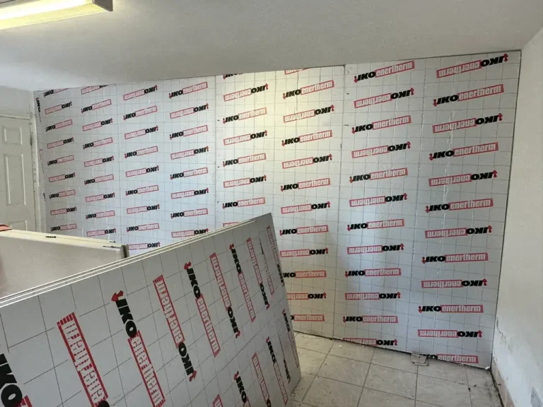 August 2025: insulation boards fixed to the walls of the room, Wembley Central