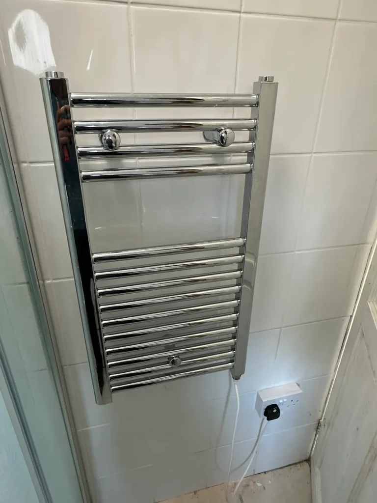 A new chrome towel rail in the bathroom, Wembley Central