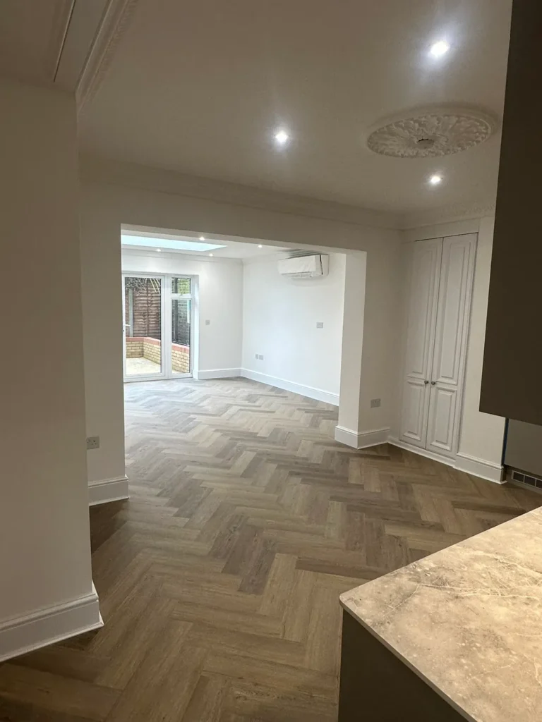 An open living space running through to the rear room, Walpole, West Ealing