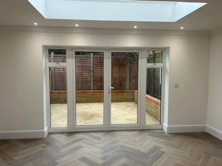 The rear room with a roof lantern and garden doors, Walpole, West Ealing
