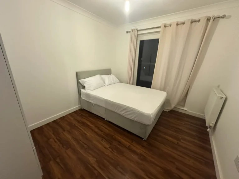 A bedroom with new flooring and paint, Yeading